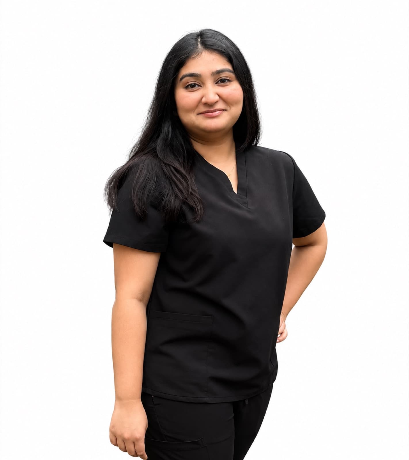 Disha Patel in black medical scrubs