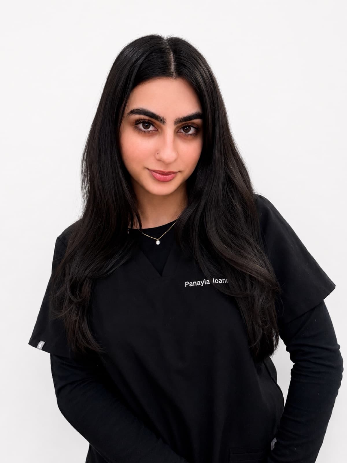 Panayia Ioannou in black medical scrubs